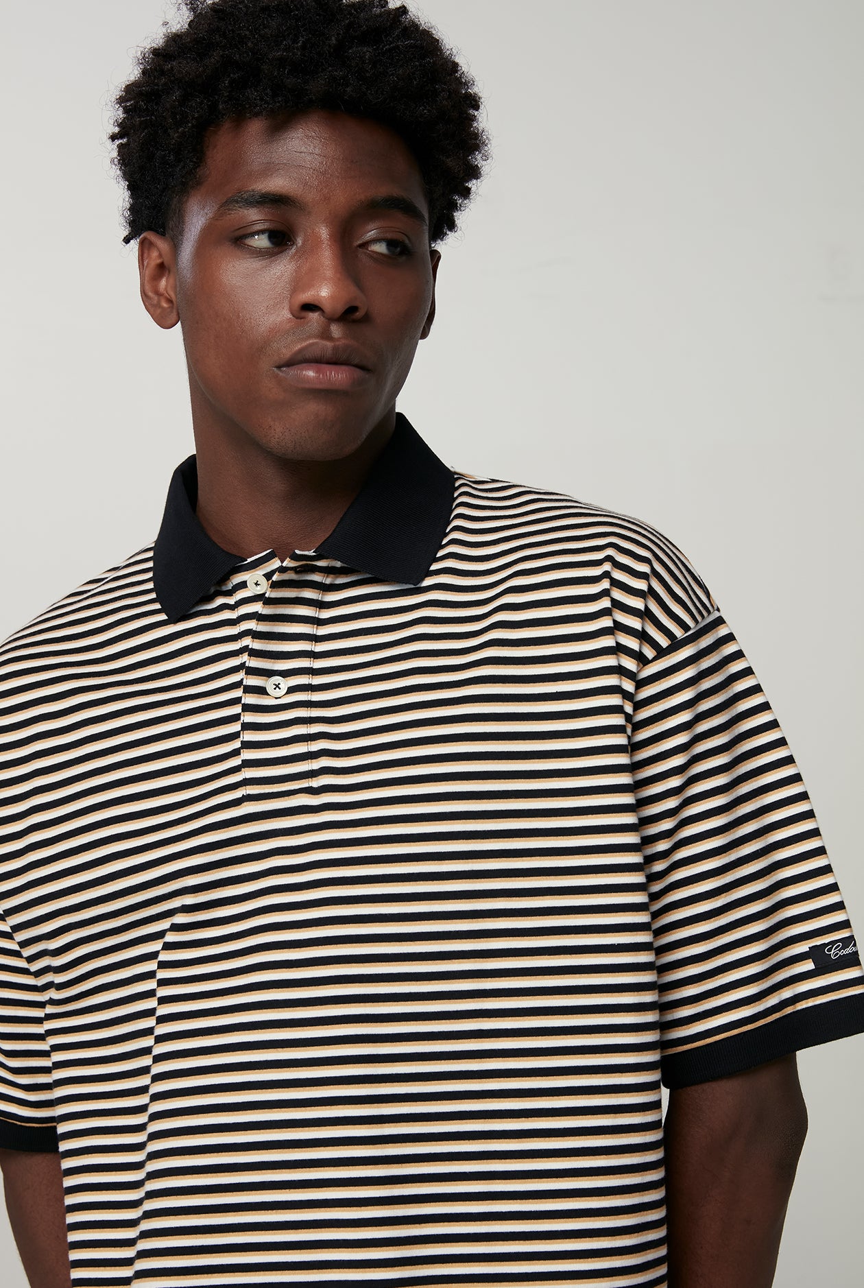 RELAXED STRIPE BLACK POLO