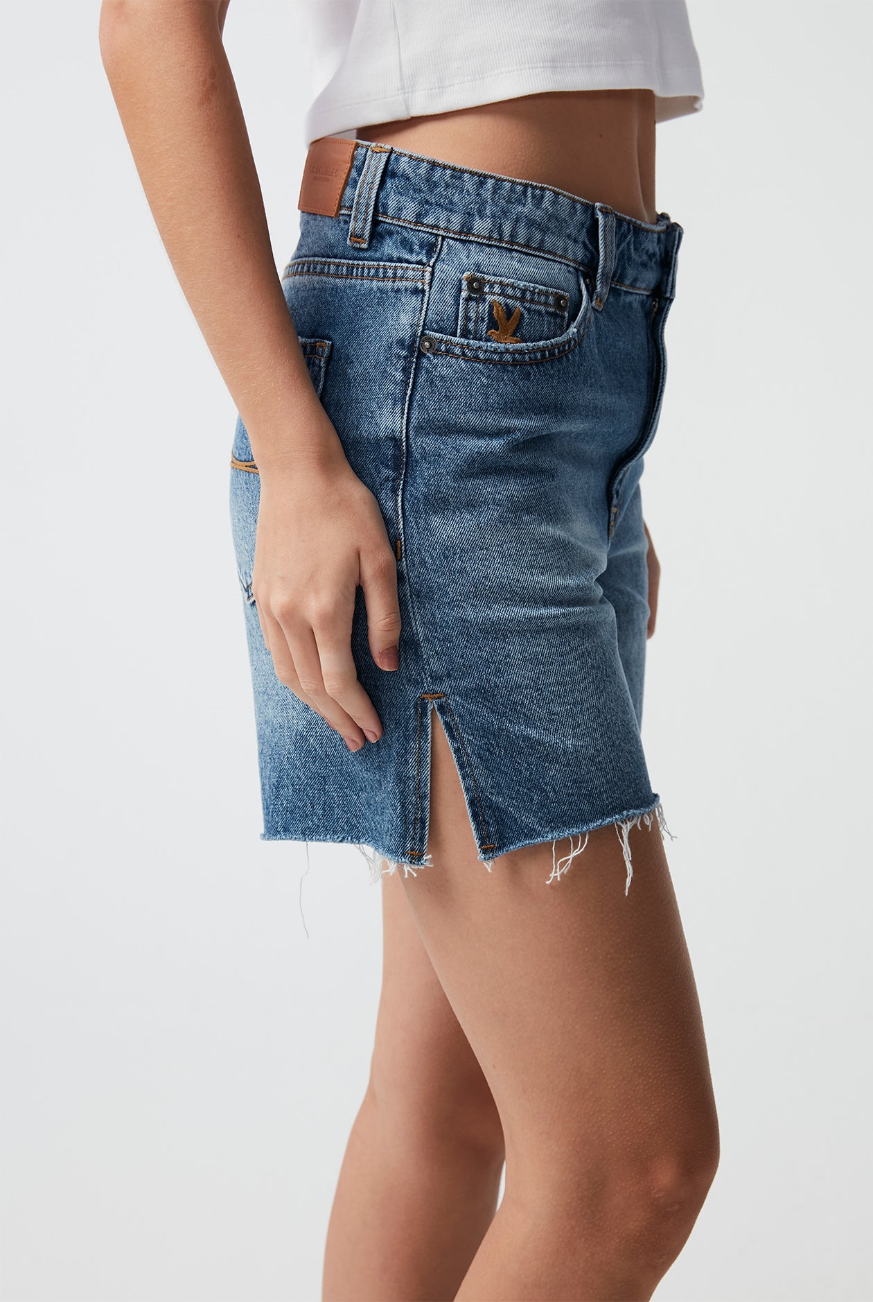 DISTRESSED DENIM SHORTS