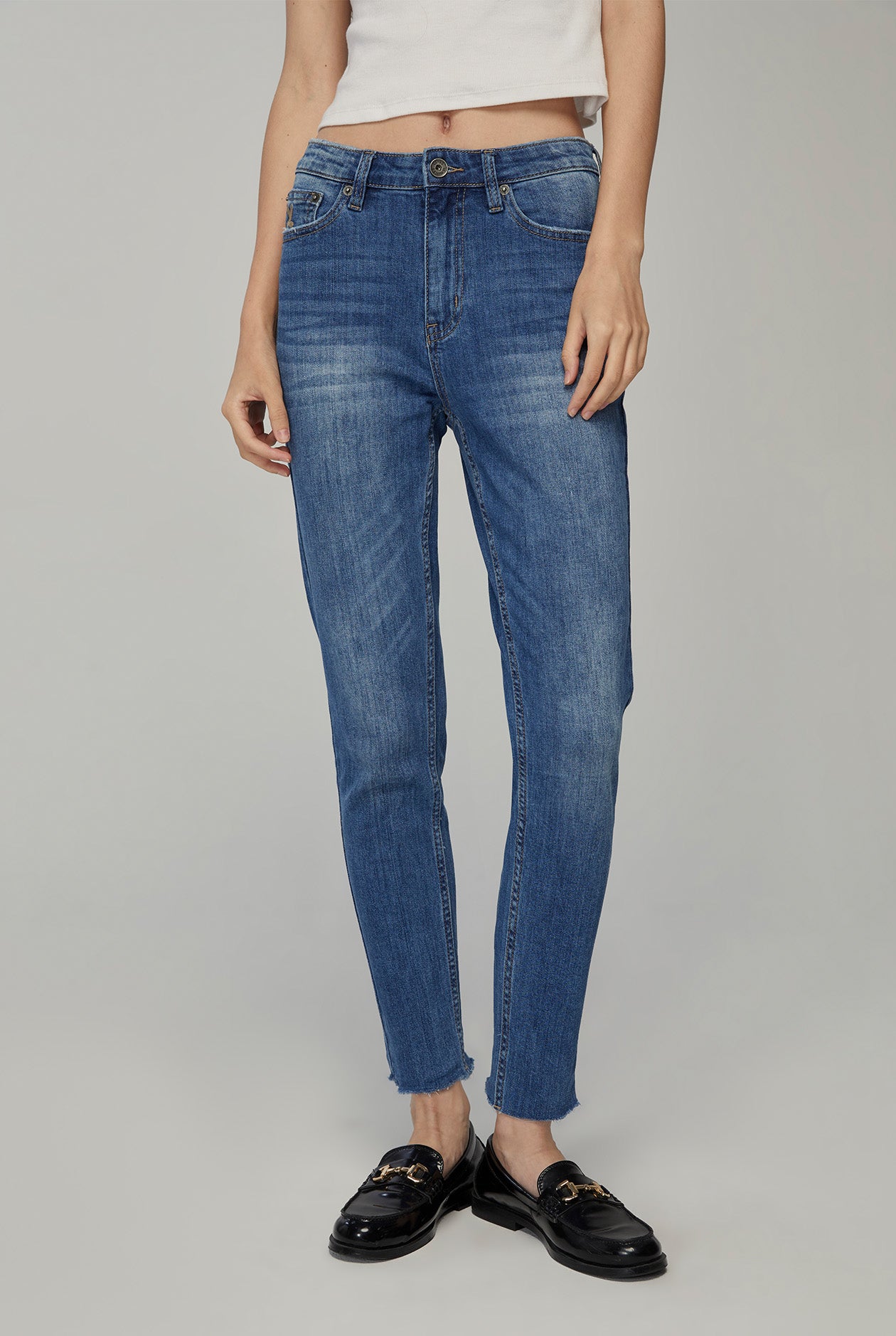 MID-RIES SKINNY JEANS