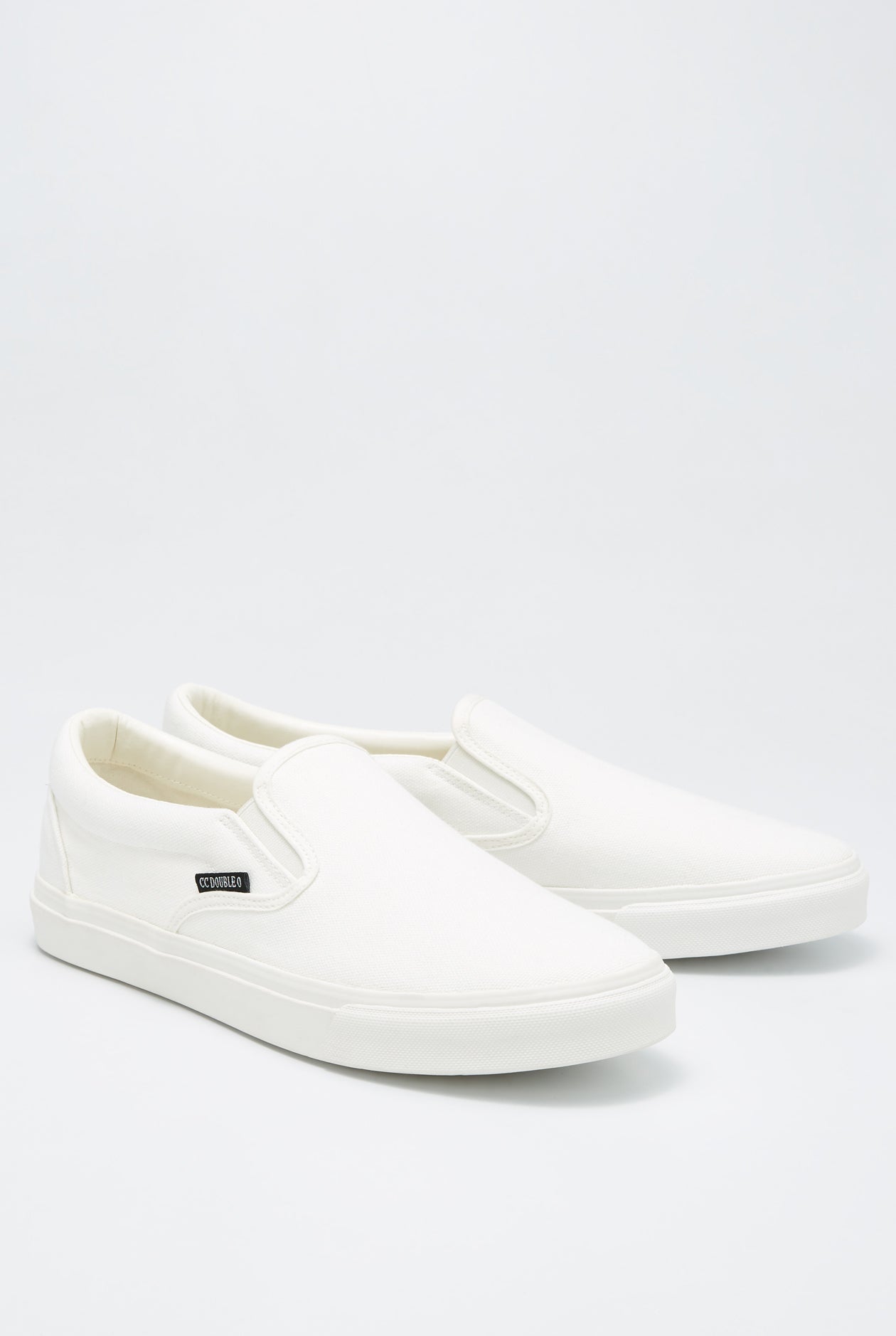 WHITE CANVAS SLIP ON SHOES