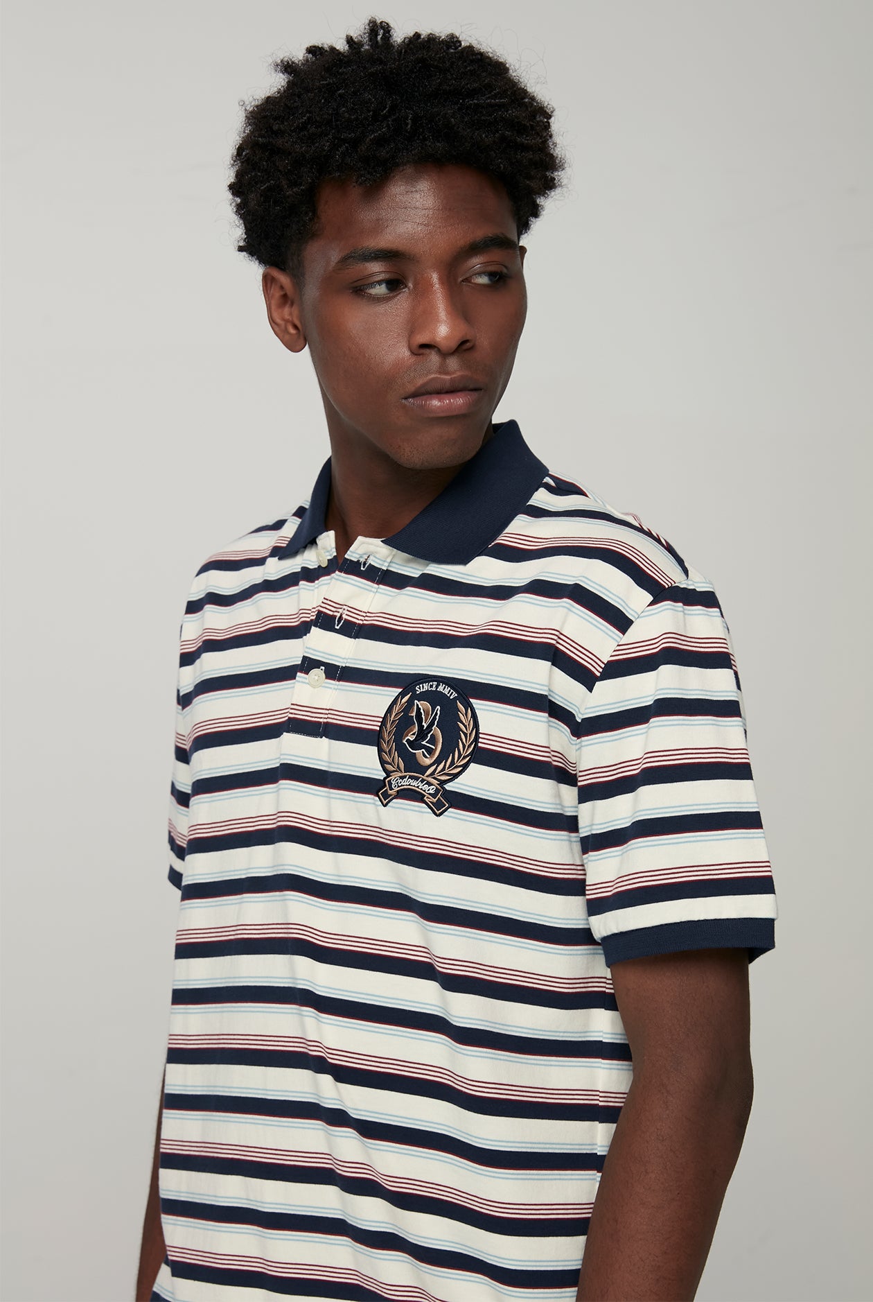 20th ANNIVERSARY BIRD LOGO NARROW STRIPED POLO