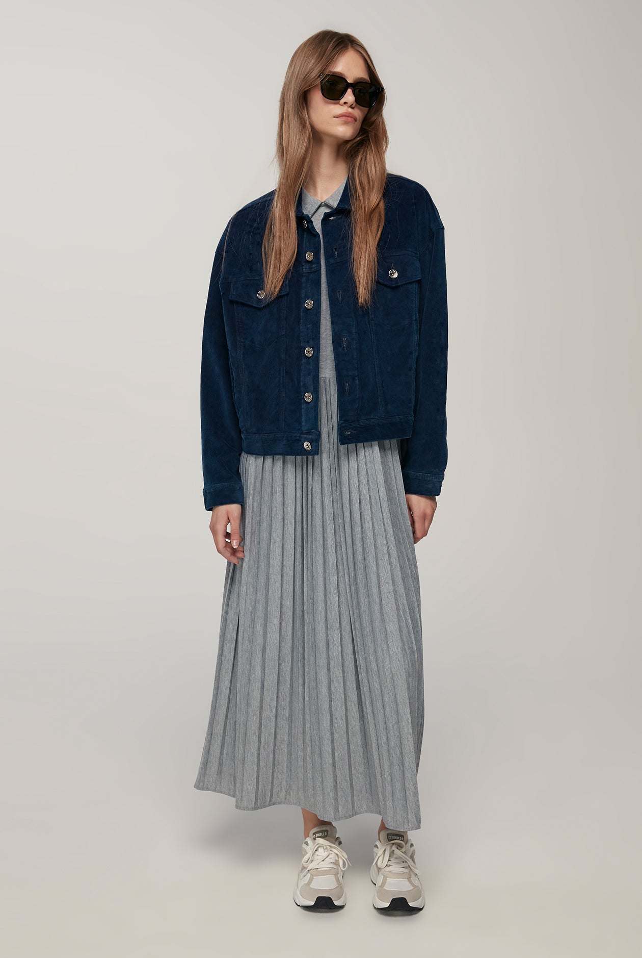 SLEEVELESS PLEATED DRESS