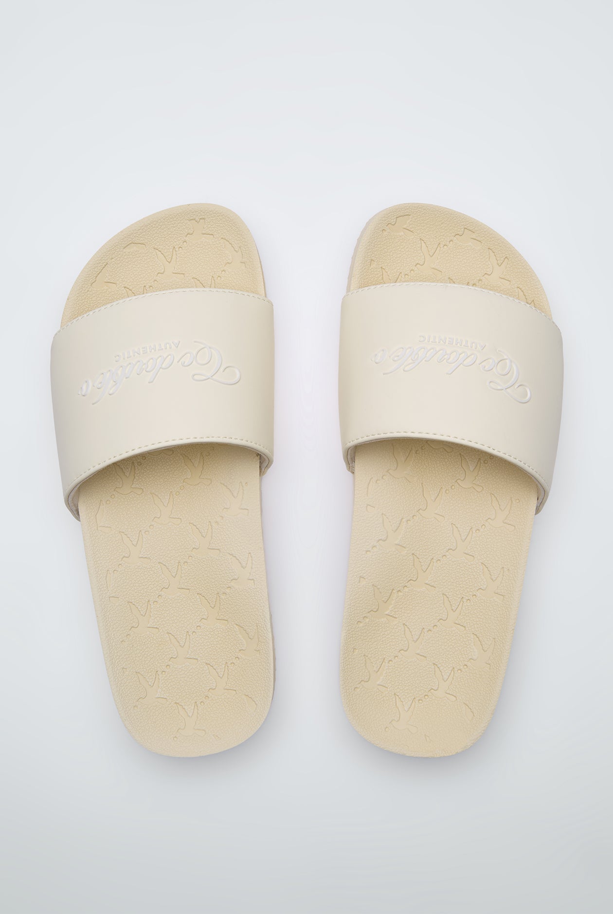 DEBOSSED MONOGRAM BIRD POOL SLIDE SANDALS