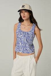 PRINTED EMBROIDERED EYELET TOP