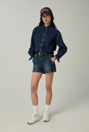 OBLIQUE FRONT DENIM SHORTS
