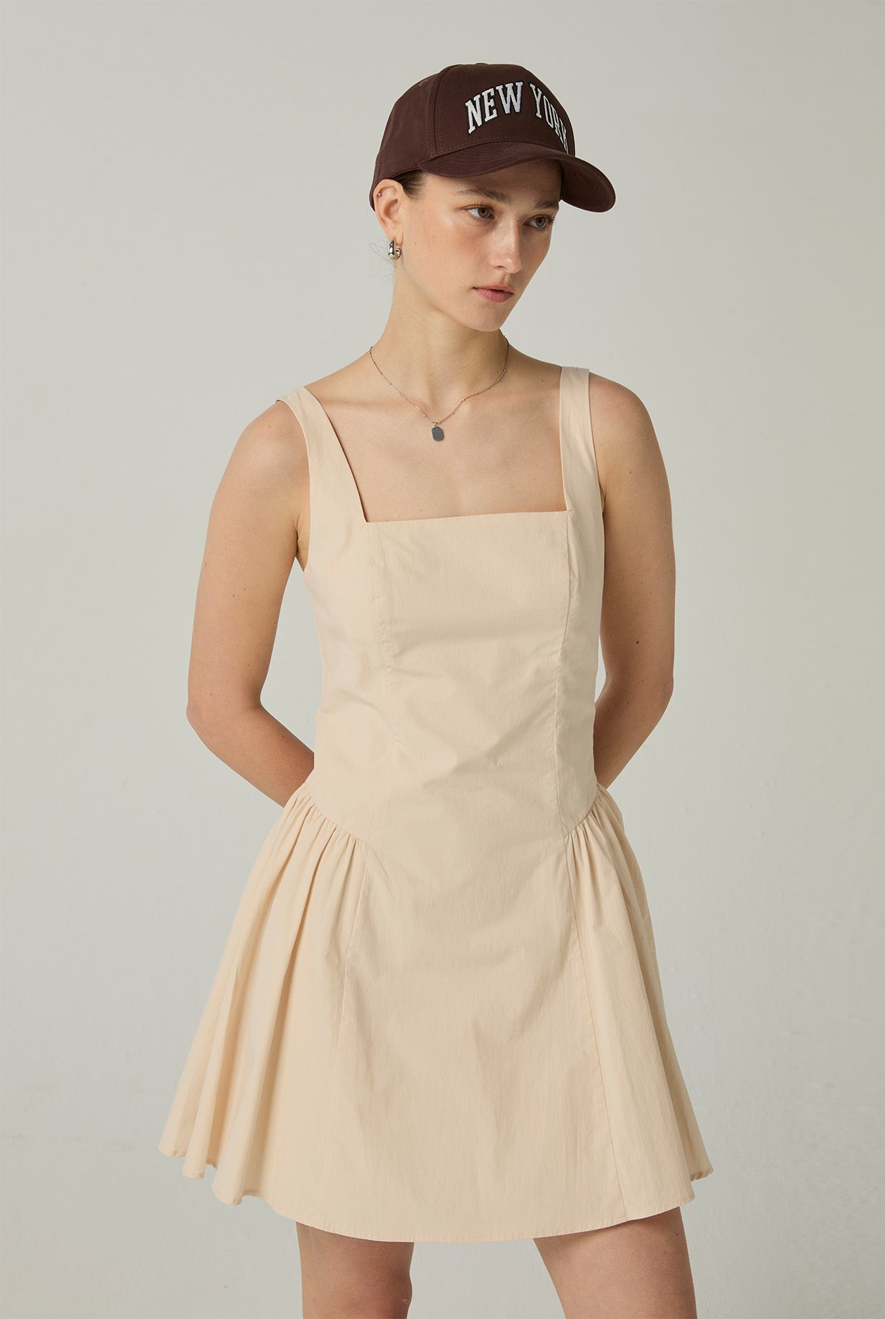 DIPPED-WAIST STRETCH MINI DRESS