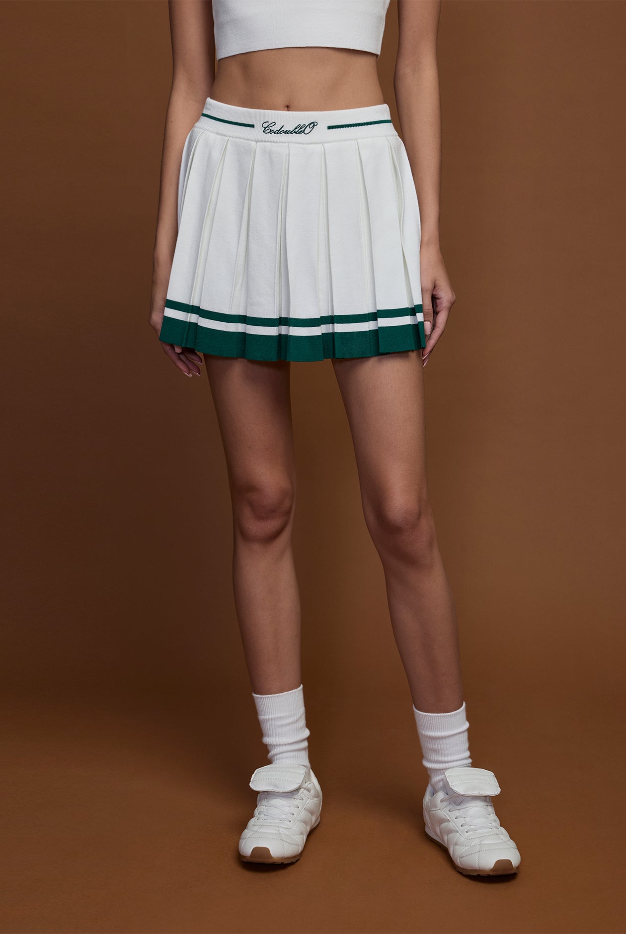 MID-RISE PLEATED SKIRT