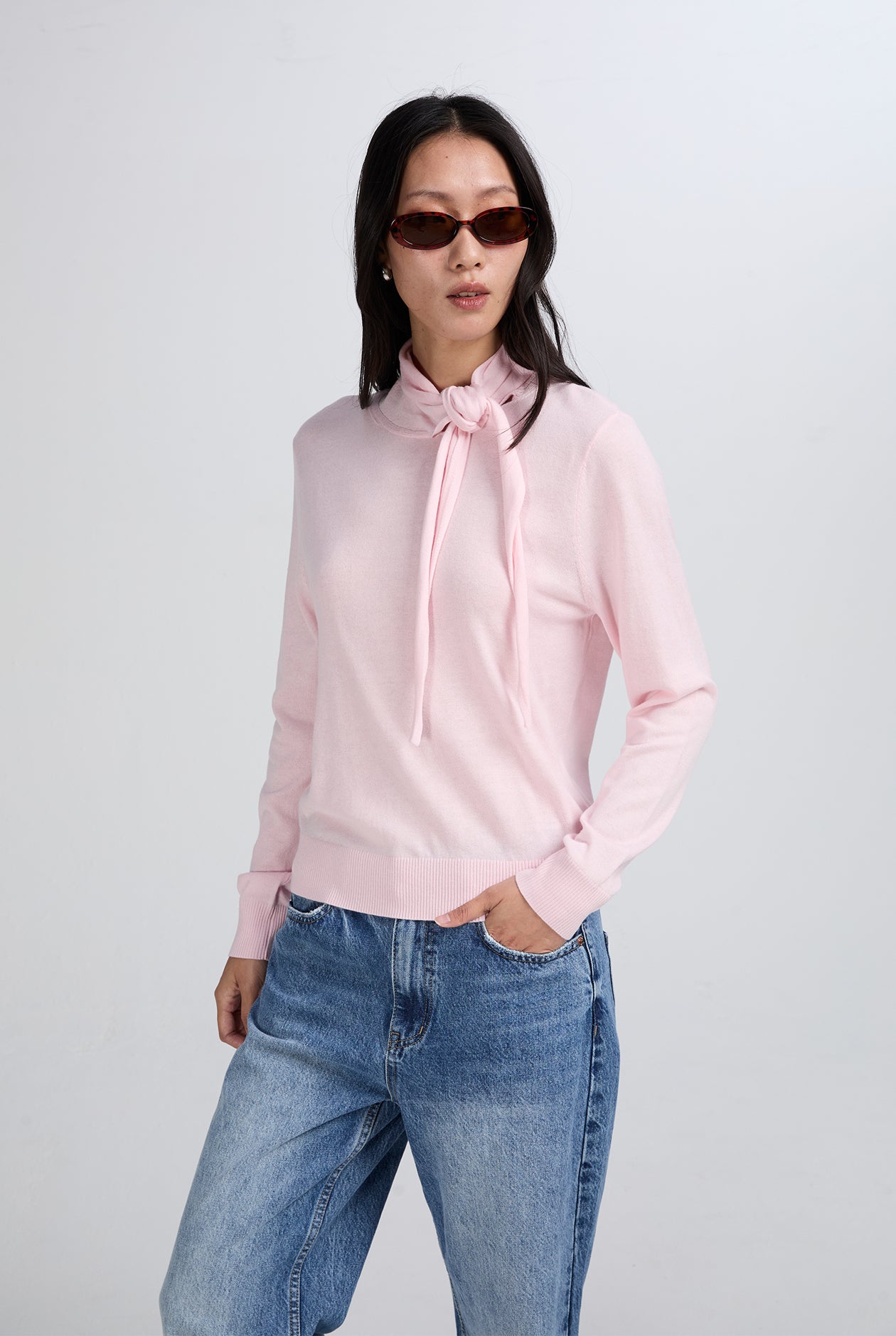 TURTLE NECK SWEATER WITH KNOT DETAIL