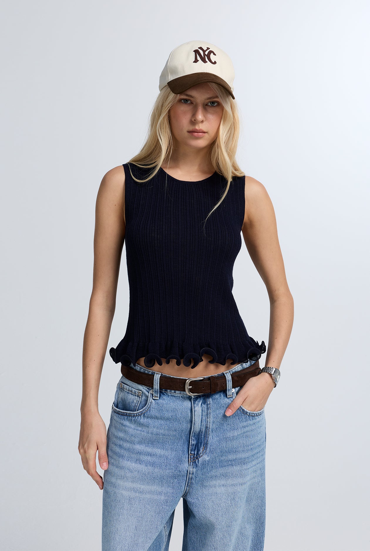 RIBBED SLEEVELESS TOP WITH RUFFLE HEM