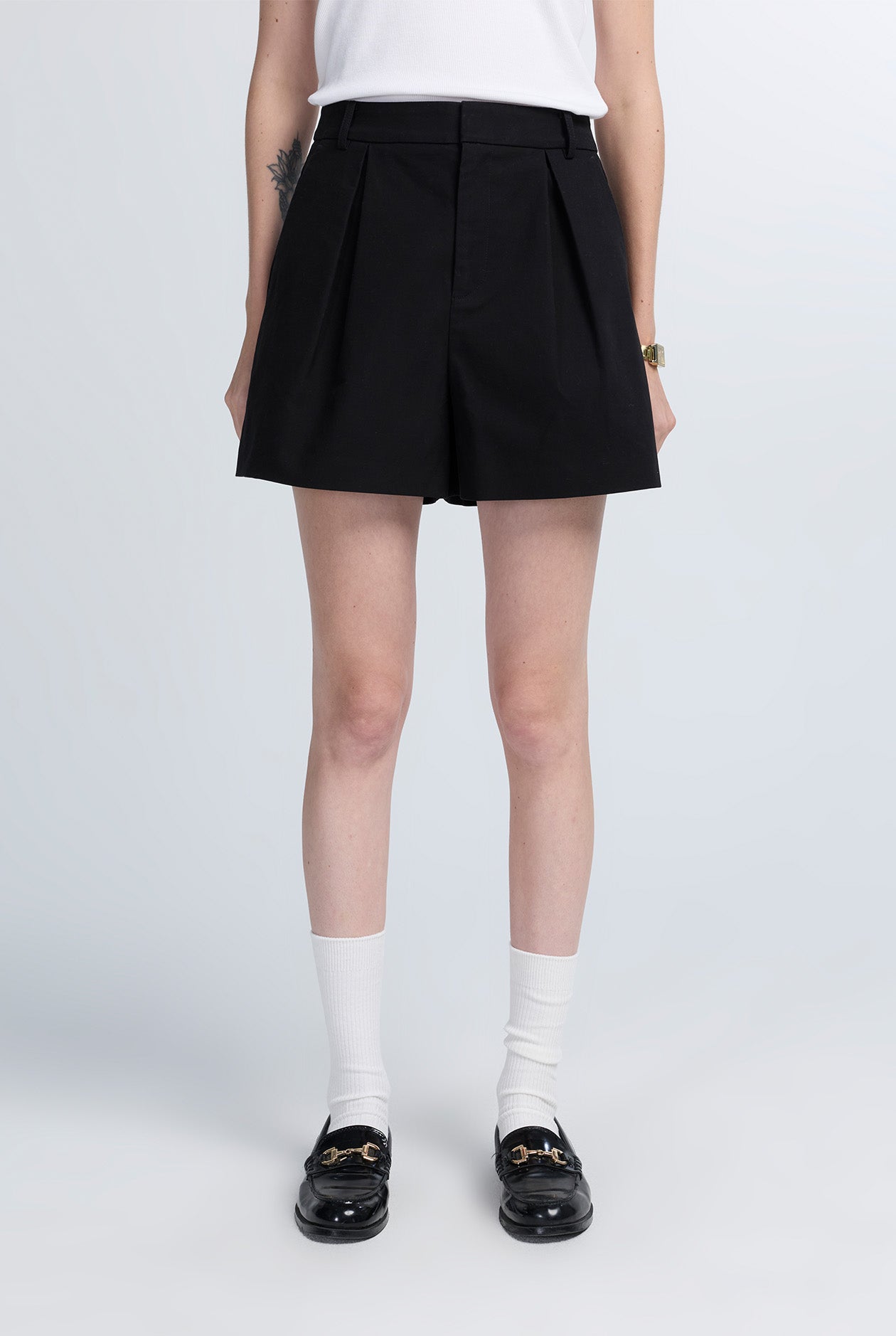 MID-RISE PLEATED SHORTS